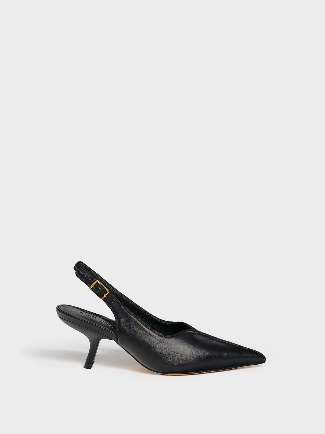 Profile view of a black leather slingback kitten heel with a grosgrain trim and angled heel detail.