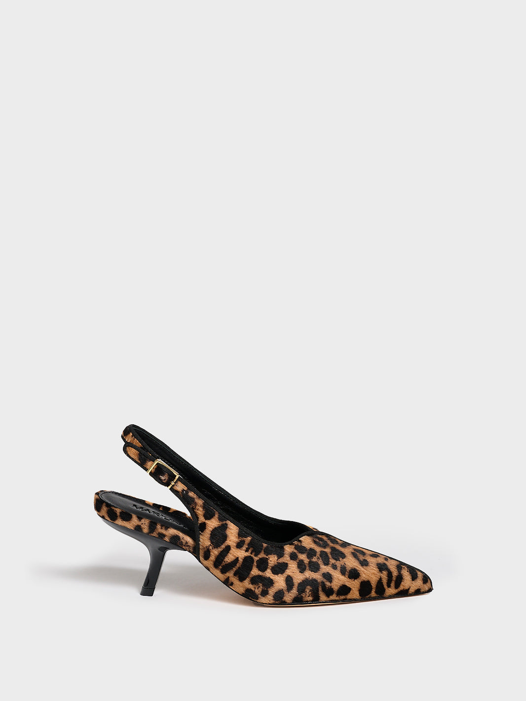 Profile view of a leopard hair calf slingback kitten heel with a grosgrain trim and angled heel detail.