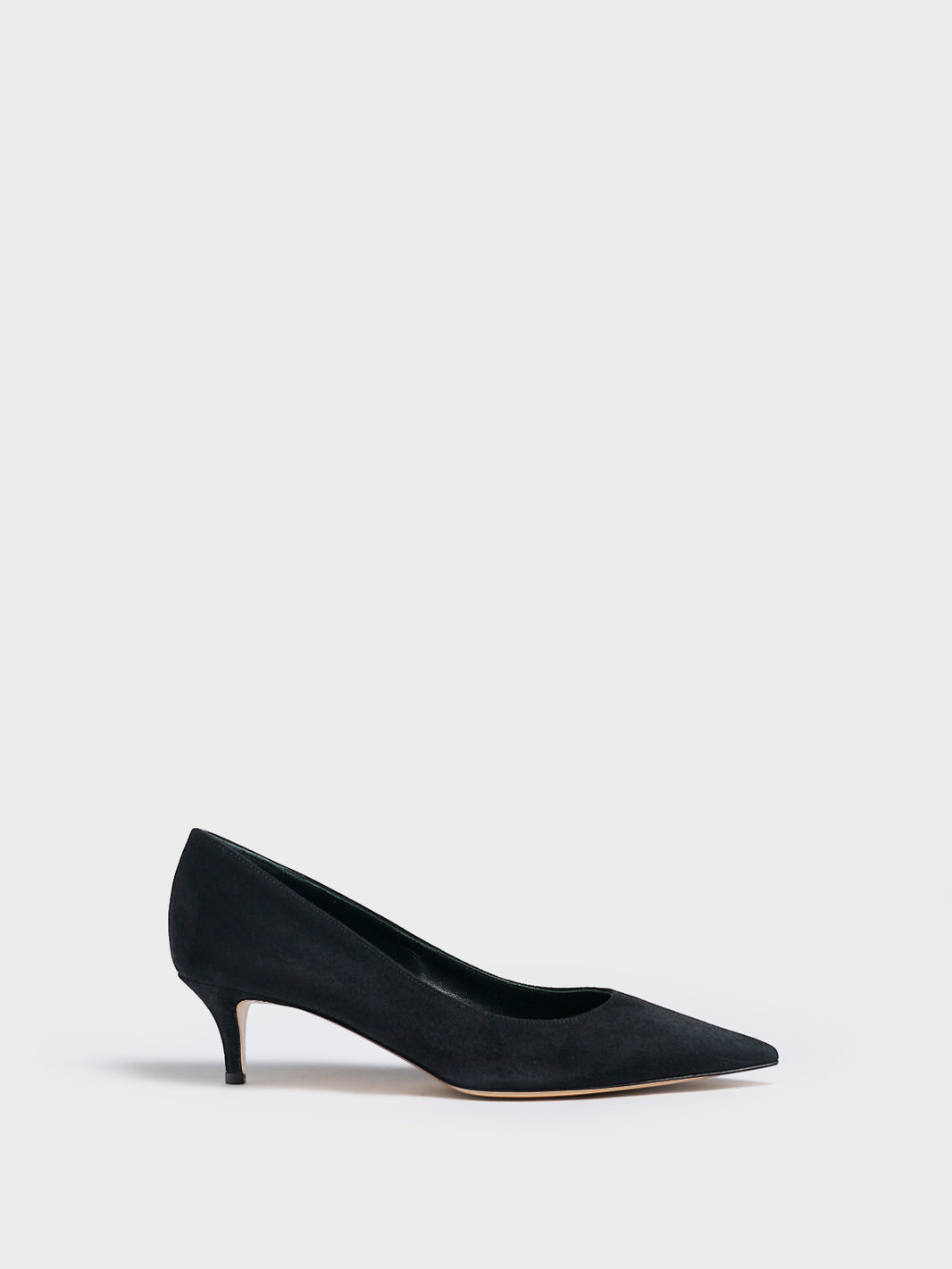 Profile view of a black suede kitten stiletto heel pump with a pointed toe.